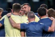 31 May 2025; Munster captain Tadhg Beirne talks to his players in the huddle before the United Rugby Championship quarter-final match between Hollywoodbets Sharks and Munster at Kings Park Stadium in Durban, South Africa. Photo by Shaun Roy/Sportsfile