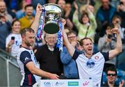 31 May 2025; New York captain Johnny Glynn, left, and James Breen lift the Lory Meagher Cup after the Lory Meagher Cup final match between Cavan and New York at Croke Park in Dublin. Photo by Stephen Marken/Sportsfile