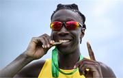 31 May 2025; Ryan Onoh of Ashton, Cork, celebrates with his gold medal after winning the Inter Boys Long Jump during the 123.ie All-Ireland Schools Track and Field Championships at Tullamore Harriers Athletics Club in Offaly. Photo by Shauna Clinton/Sportsfile