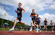31 May 2025; Odhran McBrearty of Columbas Stranorlar, Donegal, who finished second, leads eventual winner Harry McKenzie of Enniskillen Royal GS, Fermanagh, centre, around the track during the Inter Boys 3000m during the 123.ie All-Ireland Schools Track and Field Championships at Tullamore Harriers Athletics Club in Offaly. Photo by Shauna Clinton/Sportsfile