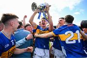 31 May 2025; Sam O'Farrell of Tipperary with the James Nowlan Cup after the oneills.com GAA Hurling All-Ireland U20 Championship final match between Kilkenny and Tipperary at UPMC Nowlan Park in Kilkenny. Photo by Ray McManus/Sportsfile