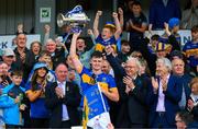 31 May 2025; Tipperary captain Sam O'Farrell lifts the James Nowlan Cup after the oneills.com GAA Hurling All-Ireland U20 Championship final match between Kilkenny and Tipperary at UPMC Nowlan Park in Kilkenny. Photo by Ray McManus/Sportsfile
