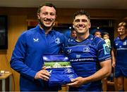 31 May 2025; Jimmy O'Brien of Leinster, right, is presented with a jersey to mark his 100th cap for Leinster by teammate Will Connors after the United Rugby Championship quarter-final match between Leinster and Scarlets at the Aviva Stadium in Dublin. Photo by Brendan Moran/Sportsfile
