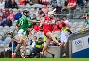 31 May 2025; Eamon Conway of Derry in action against Paul Kennedy of London during the Christy Ring Cup final match between Derry and London at Croke Park in Dublin. Photo by Stephen Marken/Sportsfile