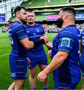 31 May 2025; Leinster players, from left, Hugo Keenan, Jack Boyle and Rabah Slimani of Leinster celebrate after the United Rugby Championship quarter-final match between Leinster and Scarlets at the Aviva Stadium in Dublin. Photo by Brendan Moran/Sportsfile