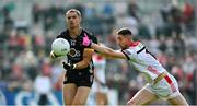 31 May 2025; Pat Havern of Down in action against Ciarán Downey of Louth during the GAA Football All-Ireland Senior Championship Round 2 match between Down and Louth at Páirc Esler in Newry, Down. Photo by Daire Brennan/Sportsfile