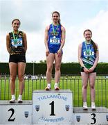 31 May 2025; Katie Doherty of Ratoath College, Meath, centre, who finished first in the Senior Girls 200m Sprint, alongside Danielle Moynihan of Holy Rosary College Mountbellew, left, who finished second, and Alisha May Maher of Tullamore College, Offaly, who finished third, during the 123.ie All-Ireland Schools Track and Field Championships at Tullamore Harriers Athletics Club in Offaly. Photo by Shauna Clinton/Sportsfile