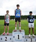 31 May 2025; Adam Rochford of Rice College Ennis, Clare, centre, who finished first in the Minor Boys 75m Hurdles, alongside Harry Melia of Presentation College Athenry, Galway, left, who finished second, and Rhylee Salazar of Royal Belfast Acad Inst, Antrim, who finished third during the 123.ie All-Ireland Schools Track and Field Championships at Tullamore Harriers Athletics Club in Offaly. Photo by Shauna Clinton/Sportsfile