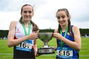31 May 2025; Sara Devany of Regent House GS Newtownards, Down, left, and Rachel Treacy of High Cross College Tuam, Galway, with the trophy after they both finished in first place in the Junior Girls 75m Hurdles during the 123.ie All-Ireland Schools Track and Field Championships at Tullamore Harriers Athletics Club in Offaly. Photo by Shauna Clinton/Sportsfile