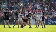 31 May 2025; Ryan Magill of Down in action against Conal McKeever, left, and Ciarán Byrne of Louth during the GAA Football All-Ireland Senior Championship Round 2 match between Down and Louth at Páirc Esler in Newry, Down. Photo by Daire Brennan/Sportsfile