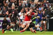 31 May 2025; Diarmuid Kilgallen of Munster attempts to break Ethan Hooker of Hollywoodbets Sharks tackle during the United Rugby Championship quarter-final match between Hollywoodbets Sharks and Munster at Kings Park Stadium in Durban, South Africa. Photo by Shaun Roy/Sportsfile