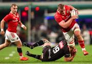 31 May 2025; Gavin Coombes of Munster attempts to slip Emile van Heerden of Hollywoodbets Sharks attempted tackle during the United Rugby Championship quarter-final match between Hollywoodbets Sharks and Munster at Kings Park Stadium in Durban, South Africa. Photo by Shaun Roy/Sportsfile