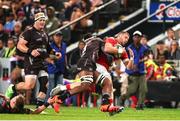 31 May 2025; Siya Kolisi of Hollywoodbets Sharks tackles Diarmuid Kilgallen of Munster during the United Rugby Championship quarter-final match between Hollywoodbets Sharks and Munster at Kings Park Stadium in Durban, South Africa. Photo by Shaun Roy/Sportsfile