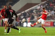 31 May 2025; Jack Crowley of Munster with a cross field kick during the United Rugby Championship quarter-final match between Hollywoodbets Sharks and Munster at Kings Park Stadium in Durban, South Africa. Photo by Shaun Roy/Sportsfile