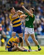 31 May 2025; Ronan Daly of Roscommon tussles with Jordan Morris of Meath during the GAA Football All-Ireland Senior Championship Round 2 match between Roscommon and Meath at King & Moffatt Dr Hyde Park in Roscommon. Photo by Tom Beary/Sportsfile