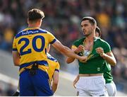 31 May 2025; Shane Cunnane of Roscommon tussles with Ciarán Caulfield of Meath during the GAA Football All-Ireland Senior Championship Round 2 match between Roscommon and Meath at King & Moffatt Dr Hyde Park in Roscommon. Photo by Tom Beary/Sportsfile