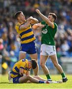 31 May 2025; Ronan Daly of Roscommon tussles with Jordan Morris of Meath during the GAA Football All-Ireland Senior Championship Round 2 match between Roscommon and Meath at King & Moffatt Dr Hyde Park in Roscommon. Photo by Tom Beary/Sportsfile