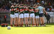 31 May 2025; Mayo players in a huddle before the GAA Football All-Ireland Senior Championship Round 2 match between Tyrone and Mayo at O'Neills Healy Park in Omagh, Tyrone. Photo by Piaras Ó Mídheach/Sportsfile