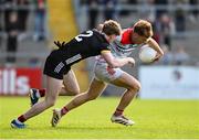 31 May 2025; Ciarán Keenan of Louth in action against Patrick McCarthy of Down during the GAA Football All-Ireland Senior Championship Round 2 match between Down and Louth at Páirc Esler in Newry, Down. Photo by Daire Brennan/Sportsfile