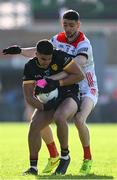 31 May 2025; Finn McElroy of Down in action against Ciarán Downey of Louth during the GAA Football All-Ireland Senior Championship Round 2 match between Down and Louth at Páirc Esler in Newry, Down. Photo by Daire Brennan/Sportsfile