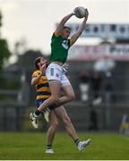 31 May 2025; Bryan Menton of Meath and Eddie Nolan of Roscommon contest a kickout during the GAA Football All-Ireland Senior Championship Round 2 match between Roscommon and Meath at King & Moffatt Dr Hyde Park in Roscommon. Photo by Tom Beary/Sportsfile