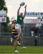 31 May 2025; Bryan Menton of Meath and Eddie Nolan of Roscommon contest a kickout during the GAA Football All-Ireland Senior Championship Round 2 match between Roscommon and Meath at King & Moffatt Dr Hyde Park in Roscommon. Photo by Tom Beary/Sportsfile