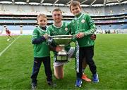 31 May 2025; Odhran, age 6, and Aodh Glynn, age 8, from Hospital-Herbertstown with their uncle Sean Glynn of London after his side's victory in the Christy Ring Cup final match between Derry and London at Croke Park in Dublin. Photo by Stephen Marken/Sportsfile