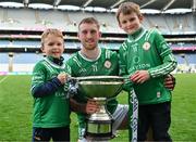 31 May 2025; Odhran, age 6, and Aodh Glynn, age 8, from Hospital-Herbertstown with their uncle Sean Glynn of London after his side's victory in the Christy Ring Cup final match between Derry and London at Croke Park in Dublin. Photo by Stephen Marken/Sportsfile