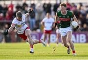 31 May 2025; David McBrien of Mayo in action against Mattie Donnelly of Tyrone during the GAA Football All-Ireland Senior Championship Round 2 match between Tyrone and Mayo at O'Neills Healy Park in Omagh, Tyrone. Photo by Piaras Ó Mídheach/Sportsfile