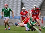 31 May 2025; Jack Morrissey of London is fouled by Patrick Turner of Derry during the Christy Ring Cup final match between Derry and London at Croke Park in Dublin. Photo by Stephen Marken/Sportsfile