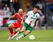 30 May 2025; Sean Maguire of Cork City in action against Mark Coyle of Shelbourne during the SSE Airtricity Men's Premier Division match between Cork City and Shelbourne at Turner's Cross in Cork. Photo by Michael P Ryan/Sportsfile