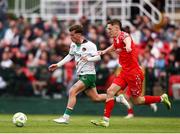 30 May 2025; Evan McLaughlin of Cork City in action against John Martin of Shelbourne during the SSE Airtricity Men's Premier Division match between Cork City and Shelbourne at Turner's Cross in Cork. Photo by Michael P Ryan/Sportsfile