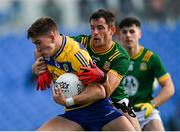 31 May 2025; Daire Cregg of Roscommon is tackled by Donal Keogan of Meath during the GAA Football All-Ireland Senior Championship Round 2 match between Roscommon and Meath at King & Moffatt Dr Hyde Park in Roscommon. Photo by Tom Beary/Sportsfile