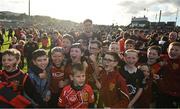 31 May 2025; John McGeough of Down celebrates with young Down supporters from Carryduff after the GAA Football All-Ireland Senior Championship Round 2 match between Down and Louth at Páirc Esler in Newry, Down. Photo by Daire Brennan/Sportsfile