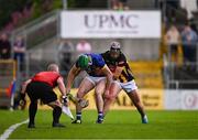 31 May 2025; Line umpire Colm McDonald watches intencely as David Costigan of Tipperary and Eoghan Lyng of Kilkenny vie for possession during the oneills.com GAA Hurling All-Ireland U20 Championship final match between Kilkenny and Tipperary at UPMC Nowlan Park in Kilkenny. Photo by Ray McManus/Sportsfile