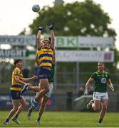 31 May 2025; Enda Smith of Roscommon and Adam O'Neill of Meath contest a kickout during the GAA Football All-Ireland Senior Championship Round 2 match between Roscommon and Meath at King & Moffatt Dr Hyde Park in Roscommon. Photo by Tom Beary/Sportsfile