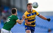 31 May 2025; Enda Smith of Roscommon in action against Seán Coffey of Meath during the GAA Football All-Ireland Senior Championship Round 2 match between Roscommon and Meath at King & Moffatt Dr Hyde Park in Roscommon. Photo by Tom Beary/Sportsfile