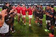 31 May 2025; Munster players are applauded from the field after the game, which they lost via a kick-off, by the Hollywoodbets Sharks after the United Rugby Championship quarter-final match between Hollywoodbets Sharks and Munster at Kings Park Stadium in Durban, South Africa. Photo by Shaun Roy/Sportsfile