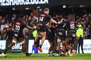 31 May 2025; Hollywoodbets Sharks players celebrate beating Munster in a kick-off to qualify for the semi-finals after the United Rugby Championship quarter-final match between Hollywoodbets Sharks and Munster at Kings Park Stadium in Durban, South Africa. Photo by Shaun Roy/Sportsfile