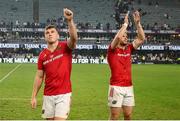 31 May 2025; Tom Farrell and Diarmuid Kilgallen of Munster thank the travelling fans for their support after Hollywoodbets Sharks beat Munster in a kick-off to qualify for the semi-finals after the United Rugby Championship quarter-final match at Kings Park Stadium in Durban, South Africa ended in a 24-24 draw. Photo by Shaun Roy/Sportsfile