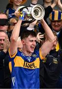 31 May 2025; Tipperary captain Sam O'Farrell lifts the James Nowlan Cup  afterthe oneills.com GAA Hurling All-Ireland U20 Championship final match between Kilkenny and Tipperary at UPMC Nowlan Park in Kilkenny. Photo by Ray McManus/Sportsfile