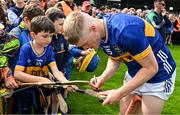31 May 2025; Oisin O'Donoghue of Tipperary signs autographs after the oneills.com GAA Hurling All-Ireland U20 Championship final match between Kilkenny and Tipperary at UPMC Nowlan Park in Kilkenny. Photo by Ray McManus/Sportsfile