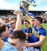 31 May 2025; Tipperary players, including the captain Sam O'Farrell, celebrate after the oneills.com GAA Hurling All-Ireland U20 Championship final match between Kilkenny and Tipperary at UPMC Nowlan Park in Kilkenny. Photo by Ray McManus/Sportsfile