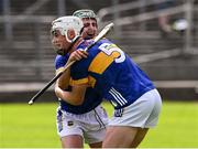 31 May 2025; Tipperary players Adam Ryan, 5, and captain Sam O'Farrell celebrate after the oneills.com GAA Hurling All-Ireland U20 Championship final match between Kilkenny and Tipperary at UPMC Nowlan Park in Kilkenny. Photo by Ray McManus/Sportsfile