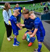 31 May 2025; Leinster mascot Leo Priestman with Jordie Barrett before the United Rugby Championship quarter-final match between Leinster and Scarlets at the Aviva Stadium in Dublin. Photo by Brendan Moran/Sportsfile