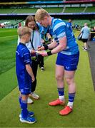 31 May 2025; Leinster mascot Leo Priestman with Jamie Osborne before the United Rugby Championship quarter-final match between Leinster and Scarlets at the Aviva Stadium in Dublin. Photo by Brendan Moran/Sportsfile