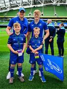 31 May 2025; Leinster mascots Leo Priestman and Conor Clarke with Garry Ringrose and Tommy O'Brien before the United Rugby Championship quarter-final match between Leinster and Scarlets at the Aviva Stadium in Dublin. Photo by Brendan Moran/Sportsfile