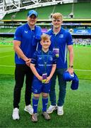31 May 2025; Leinster mascot Conor Clarke with Garry Ringrose and Tommy O'Brien before the United Rugby Championship quarter-final match between Leinster and Scarlets at the Aviva Stadium in Dublin. Photo by Brendan Moran/Sportsfile