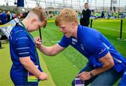 31 May 2025; Leinster mascot Conor Clarke with Tommy O'Brien before the United Rugby Championship quarter-final match between Leinster and Scarlets at the Aviva Stadium in Dublin. Photo by Brendan Moran/Sportsfile