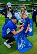 31 May 2025; Leinster mascot Leo Priestman with Garry Ringrose before the United Rugby Championship quarter-final match between Leinster and Scarlets at the Aviva Stadium in Dublin. Photo by Brendan Moran/Sportsfile
